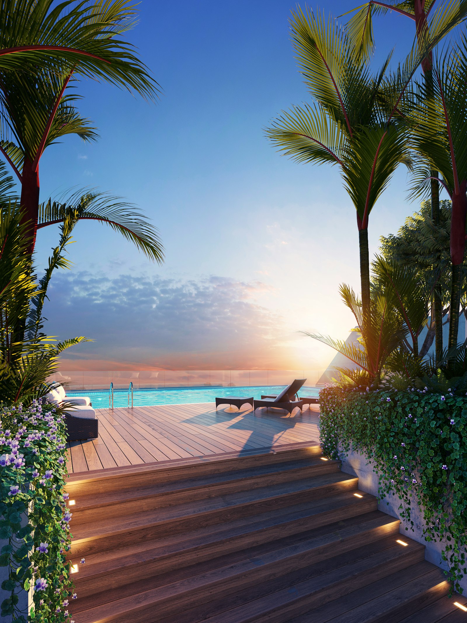 Infinity pool terrace at dusk surrounded by lanterns and lounge beds